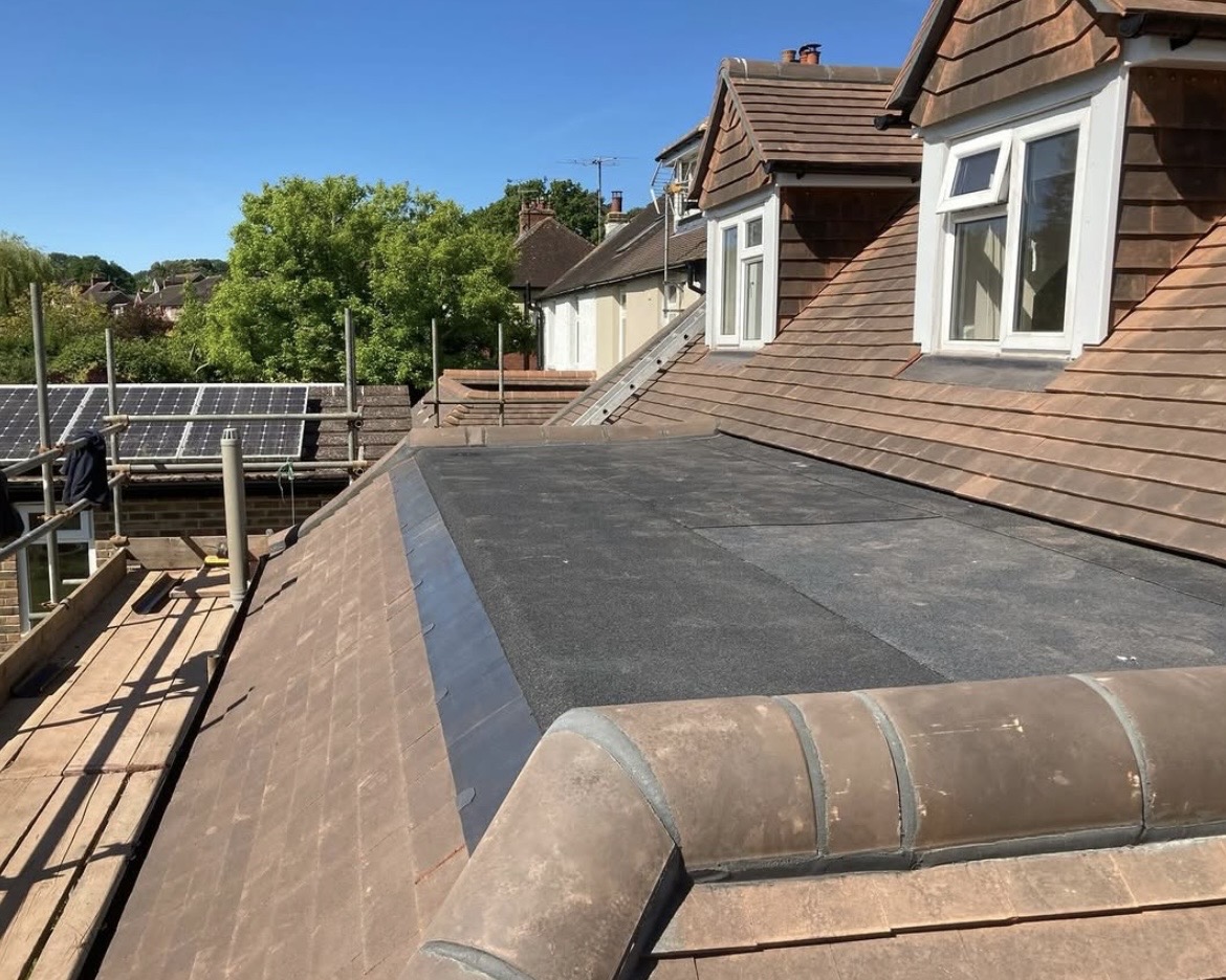 Strip & re-tile — Newdigate